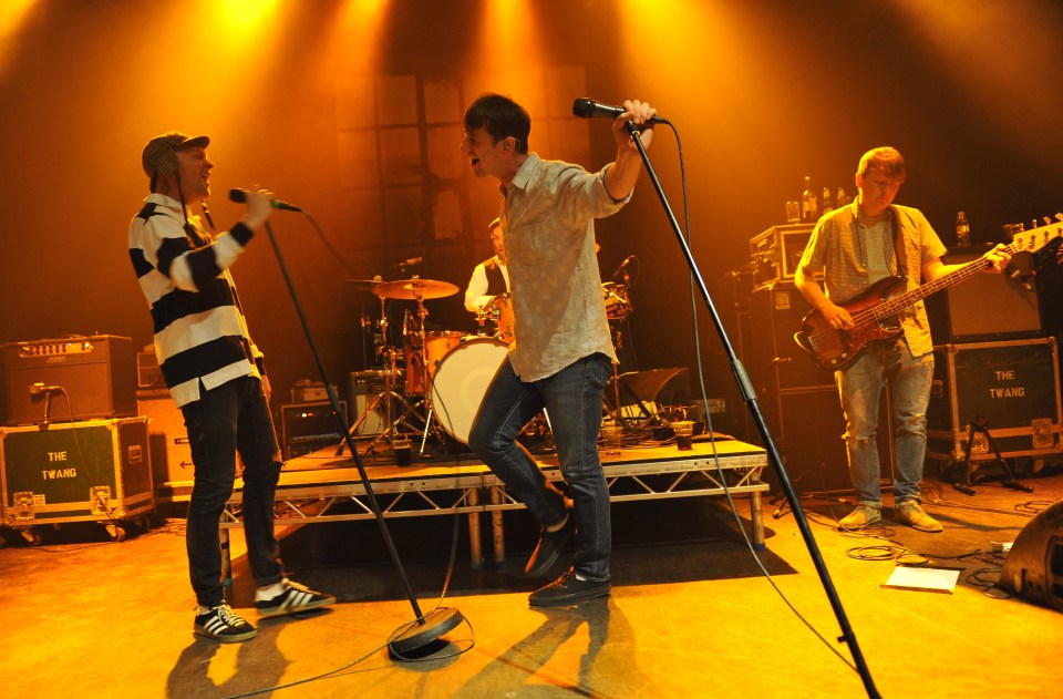 Jon (right) onstage with The Twang at Shepherd’s Bush Empire in 2013