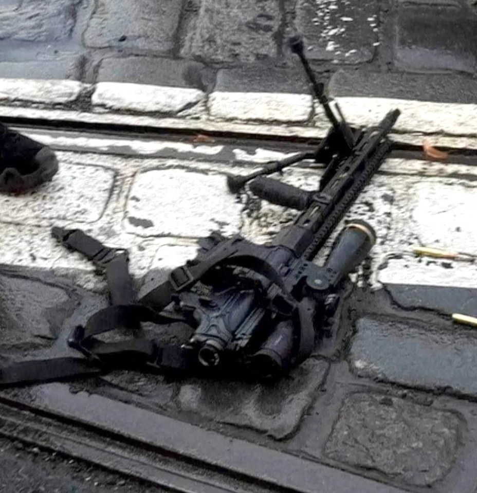 The automatic rifle that was used to gun down his 12 victims and injure dozens more