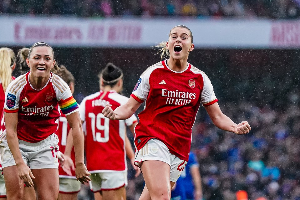 Alessia Russo scored twice as Arsenal won in front of a record attendance