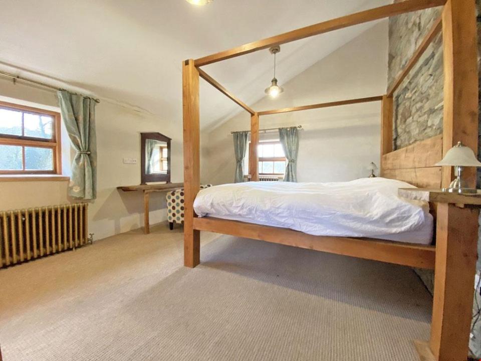 The house has four luxury bedrooms, with two featuring en-suite shower rooms