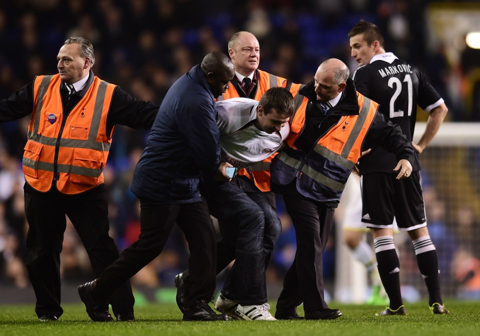 Jarvis was tackled after his pitch invasion during a Tottenham game