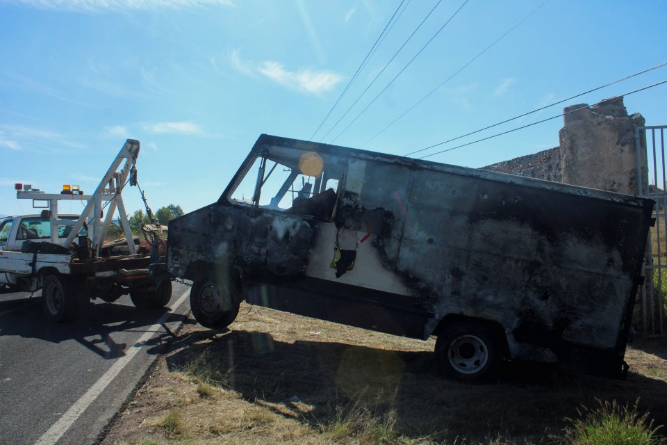 Burnt cars in the aftermath of the shooting