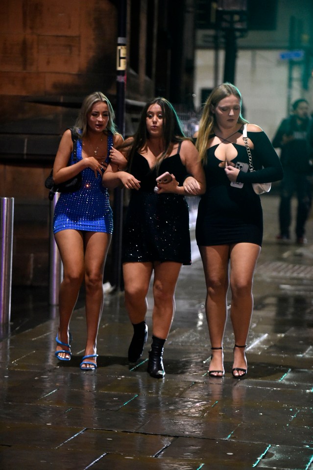 Manchester revellers battled the rain before counting down to midnight