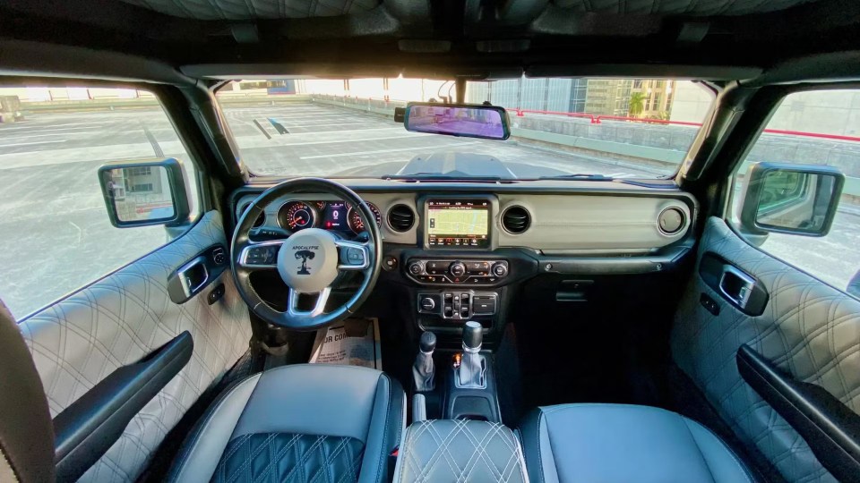 The car has cameras that allow the driver to see 360-degrees around it