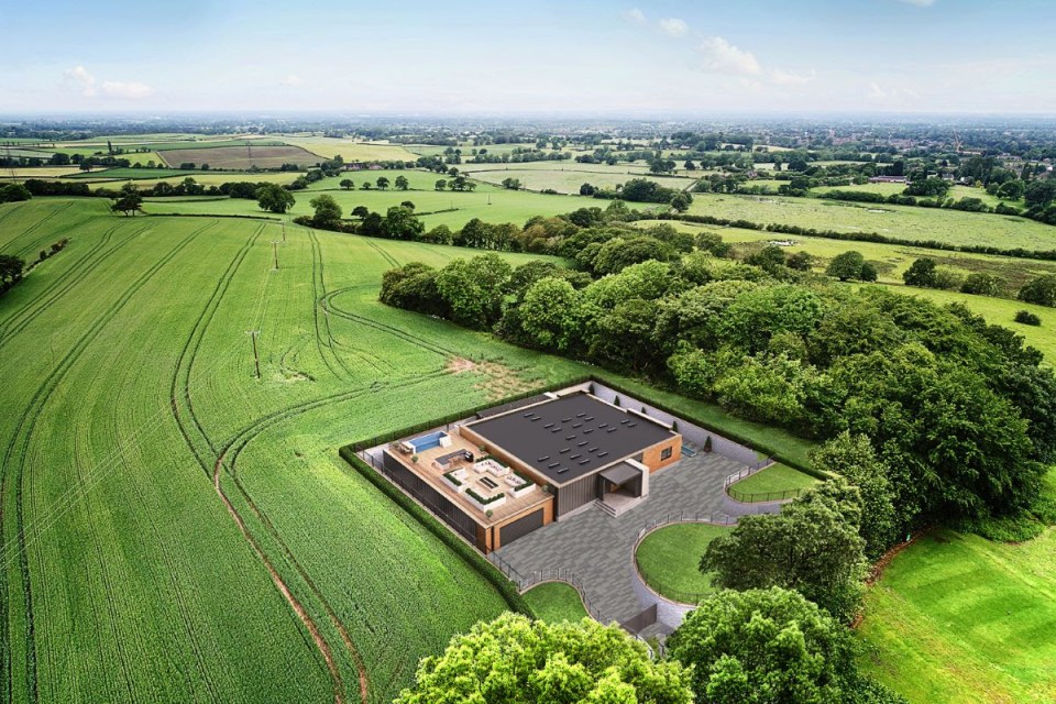 The unfinished development will be offered in an online auction on Monday January 22  - pictured is an an aerial view artist's impression of how the plot could look (picture credit: Auction House)