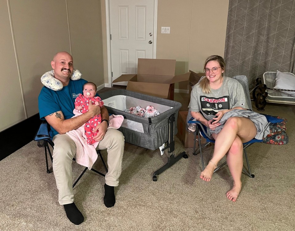 Brandon with baby Carter and wife Lauren before he fell unwell with flu-like symptoms