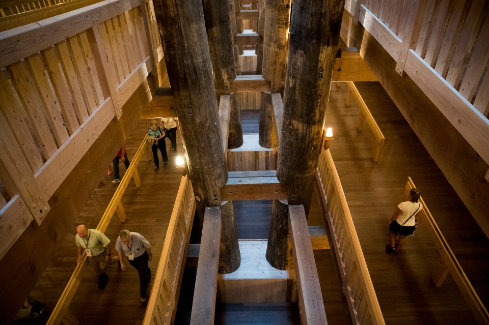 Visitors wander around one of its many decks (inside the ark)