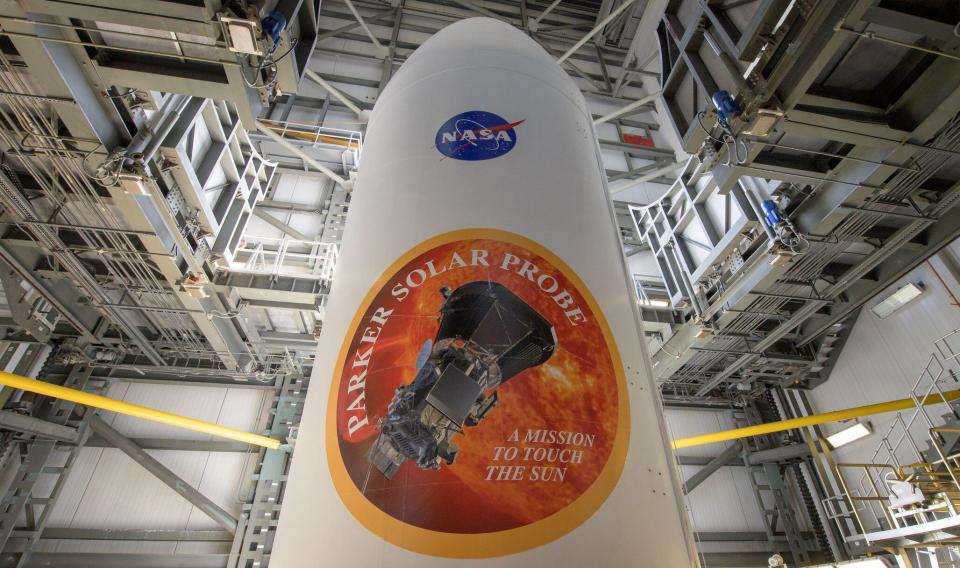 The Parker Solar Probe pre-launch in 2018, seen with the NASA and Parker Solar Probe emblems