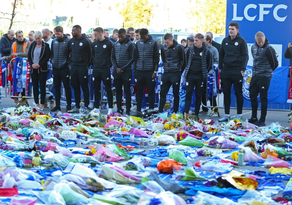 Leicester City players visiting tributes in 2018