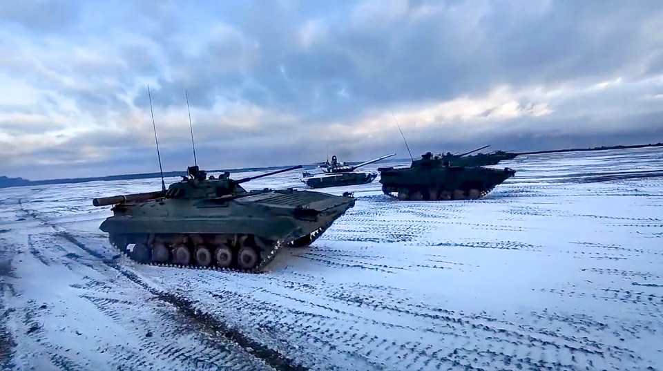 Russian and Belarusian tanks drive during joint military drills in 2022