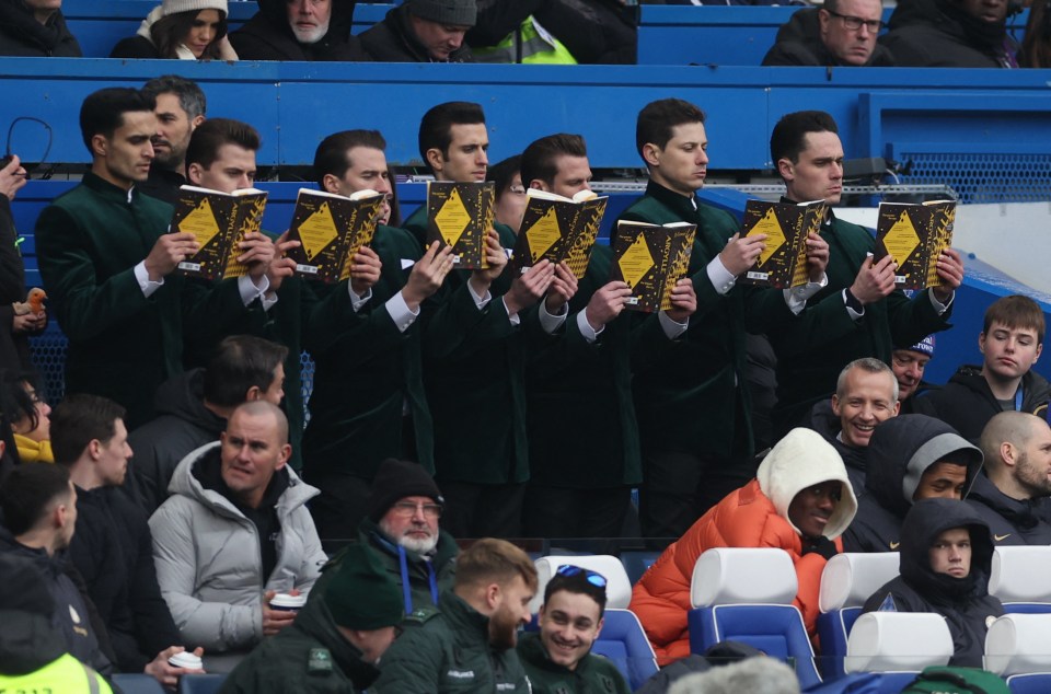 The group could be seen reading a book and brushing their teeth