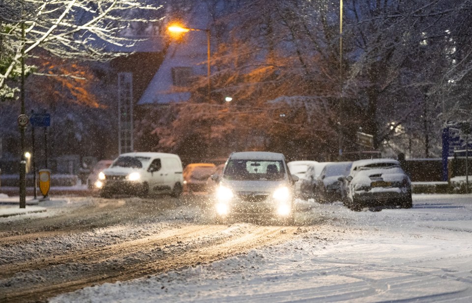 Drivers like these hardy souls in Liverpool on Tuesday have been warned of the potential for severe disruption