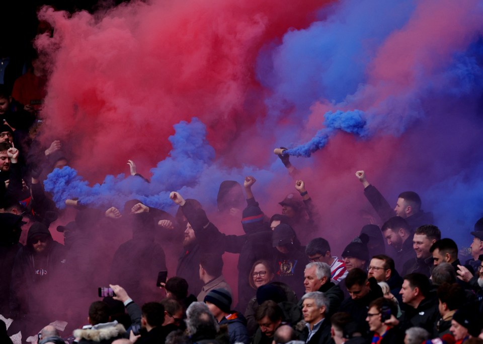 Crystal Palace fans let off flares in the away end