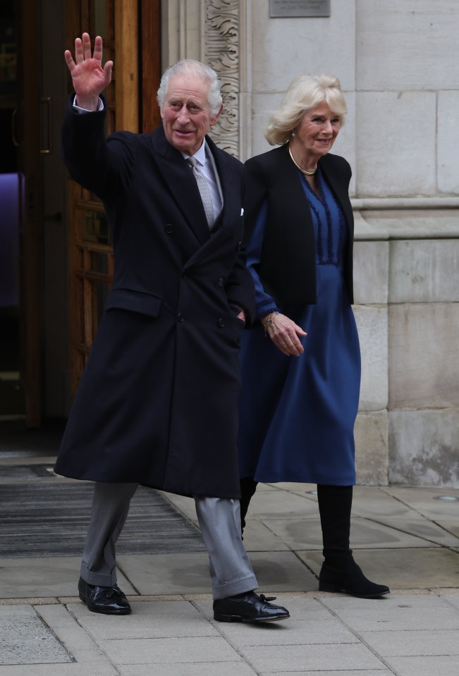 The King appeared in good spirits and waved as he left hospital this afternoon