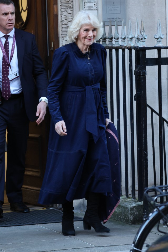 The Queen was seen smiling as she left the clinic today