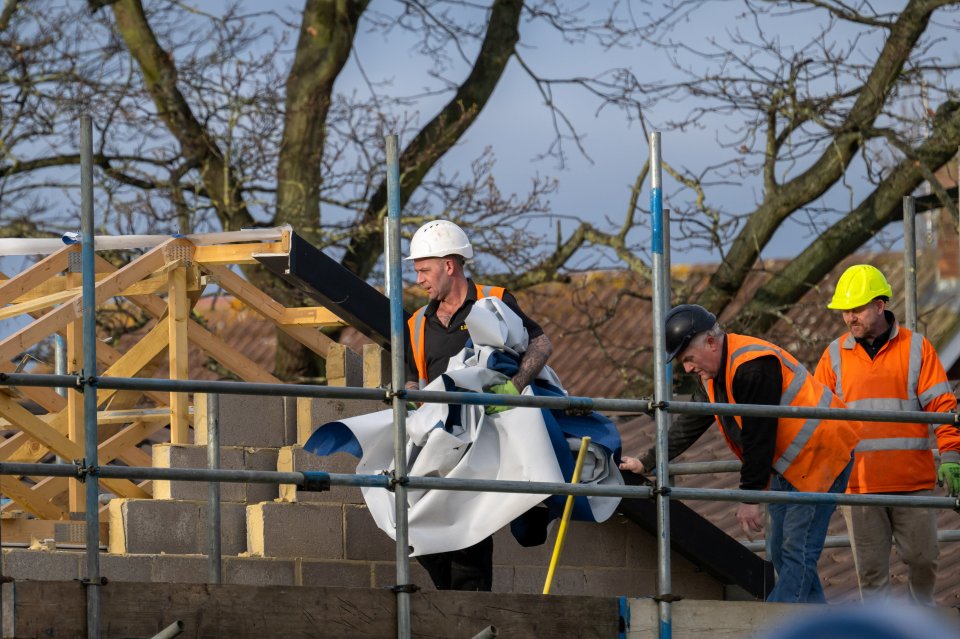 Demolition contractors start to remove the roof tiles of the controversial £200k spa building in the grounds of Hannah Ingram-Moore’s, £1.2m mansion