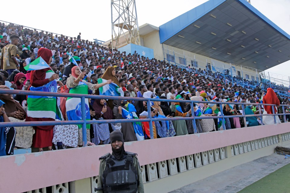 Fans watch the football league match between Hirshabele and Jubaland at the renovated stadium