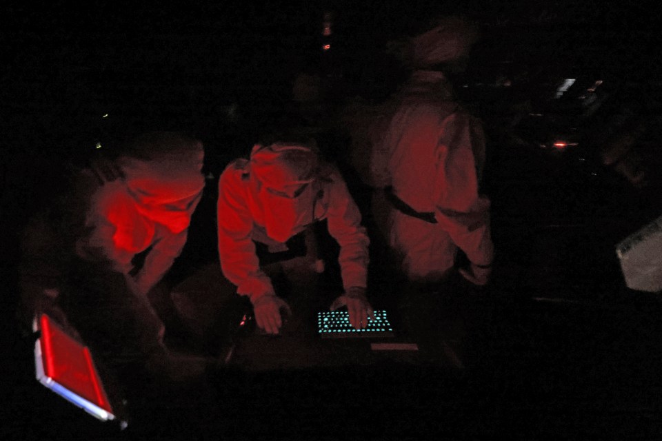 Inside the operation room of HMS Diamond, sailors prepare to fire Sea Viper missiles in the Red Sea