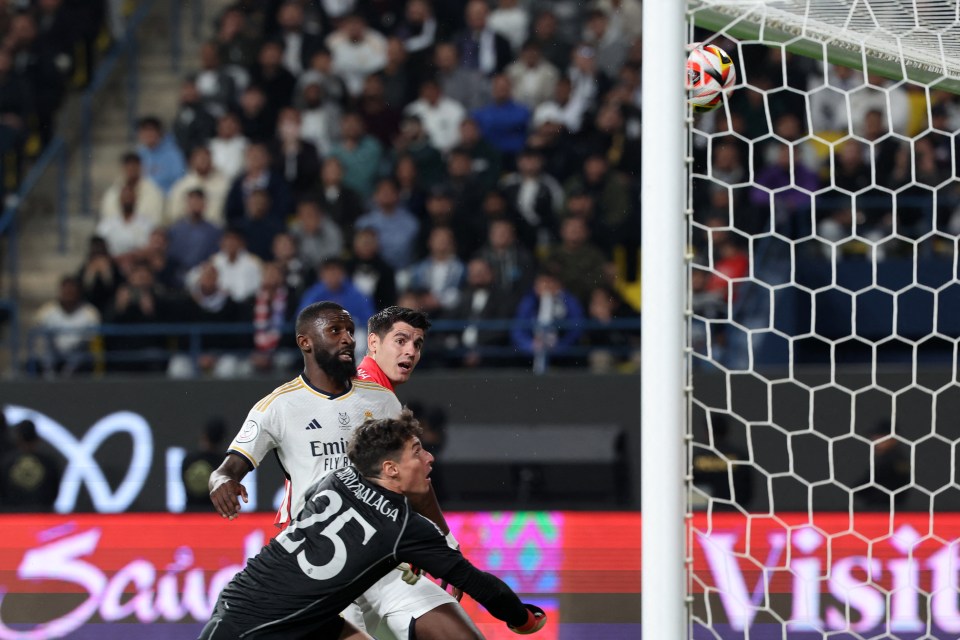 Real Madrid keeper Kepa and Antonio Rudiger watch as the centre-back nets an own goal as fellow ex-Chelsea ace Alvaro Morata hovers