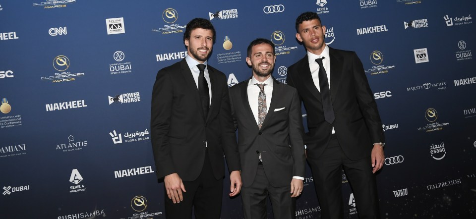 Man City trio Ruben Diaz, Bernardo Silva and Matheus Nunes pose for photos