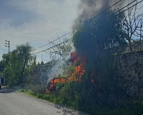 The moment the terror leader's car erupts into flames after being hit