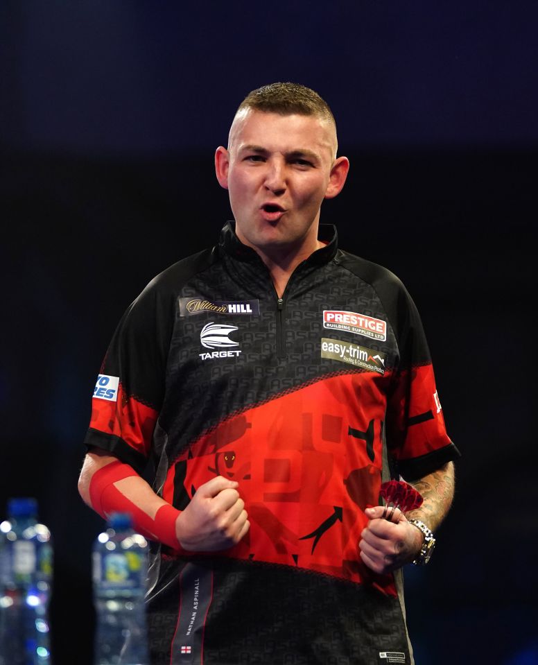 Nathan Aspinall is a darts player from Stockport, England