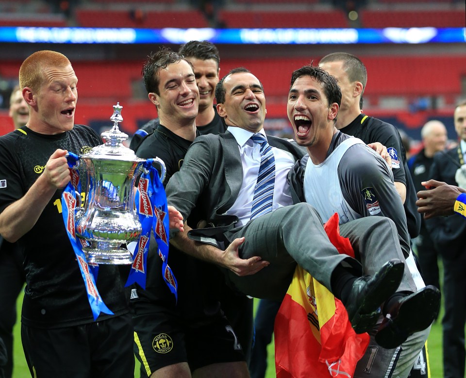 Wigan celebrate winning the FA Cup with boss Roberto Martinez