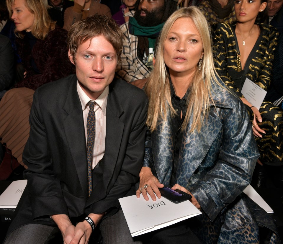 Count Nikolai von Bismarck and Kate Moss in the front row (Photo by Swan Gallet/WWD/Penske Media via Getty Images)