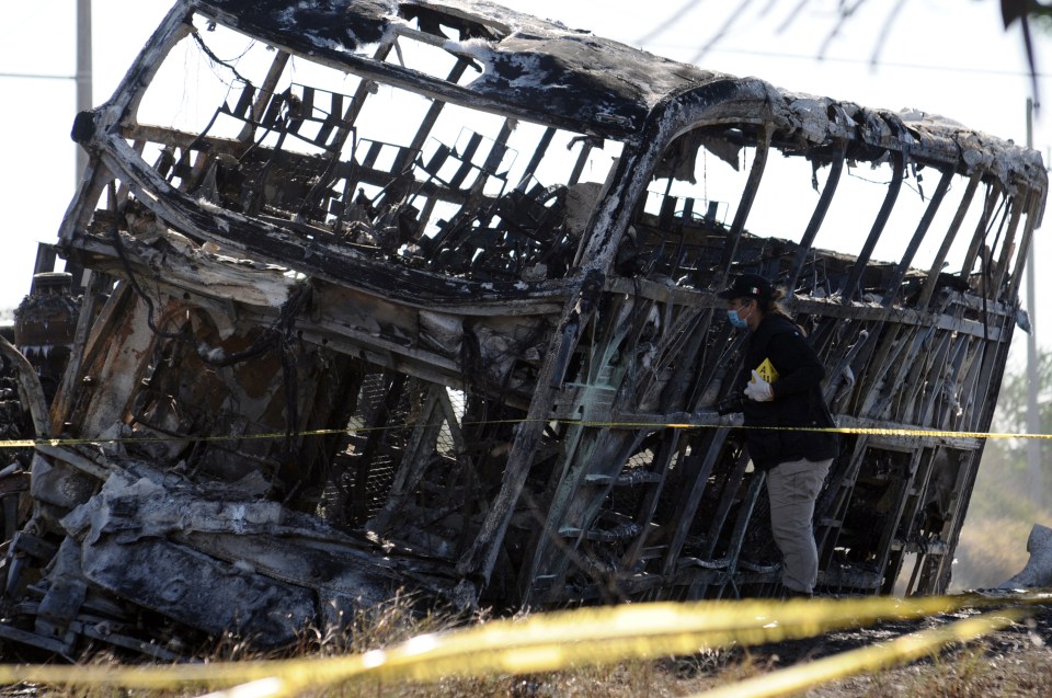 The double-decker bus was reduced to a burnt-out metal frame following the collision