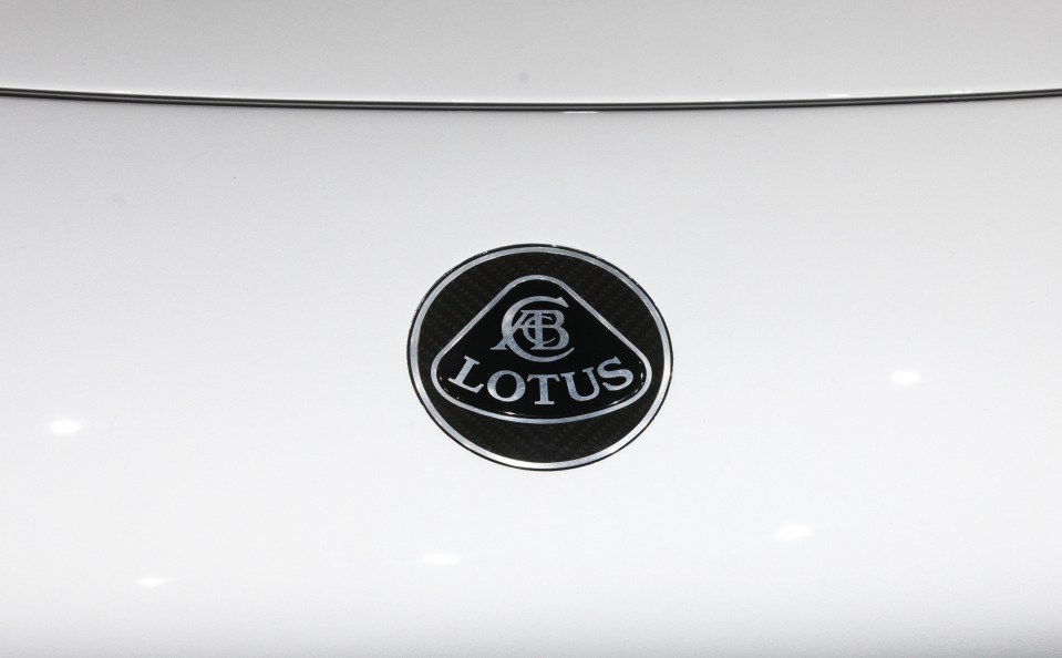 A badge is seen on the front of the Lotus Evija electric hypercar