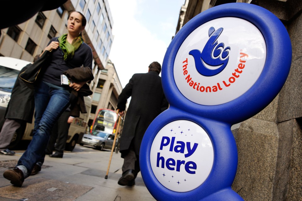 The National Lottery sign outside a newsagents shop