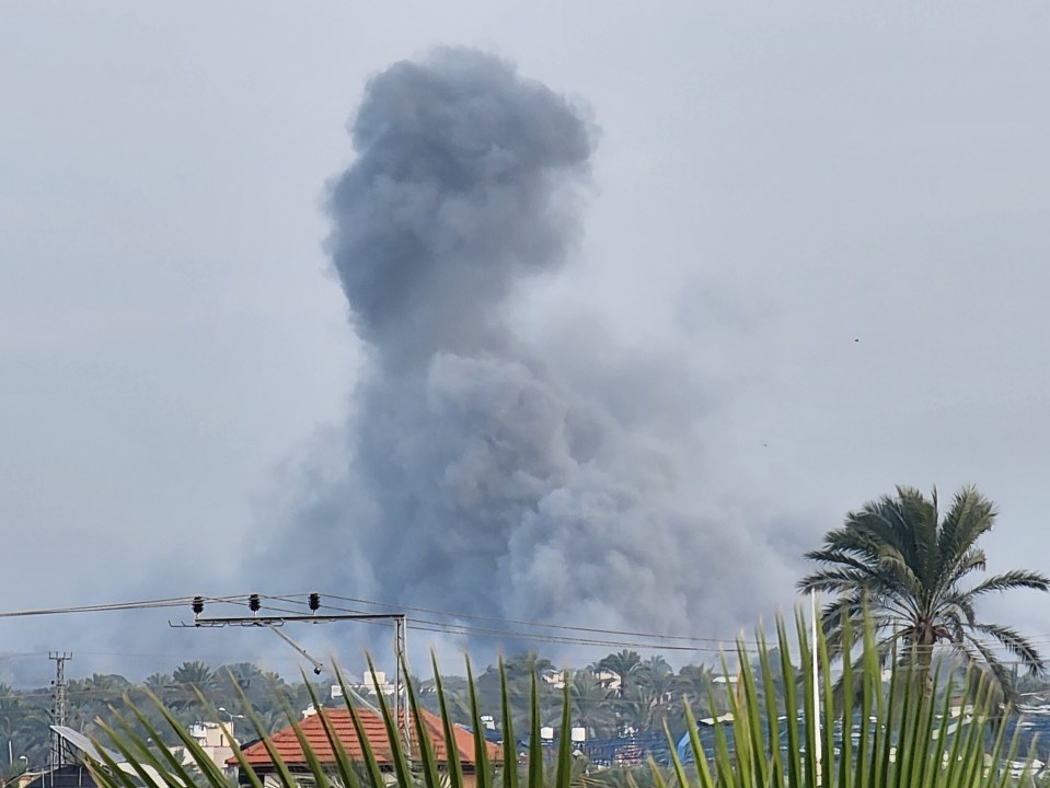 Black smoke rises over residential areas in Gaza on Monday