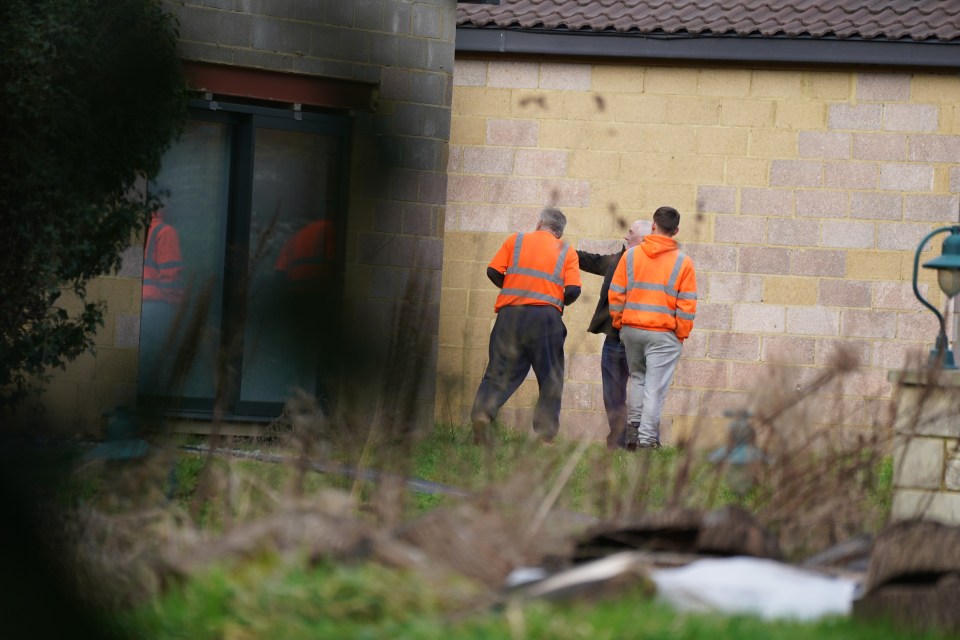 Builders inspecting the property ahead of its destruction