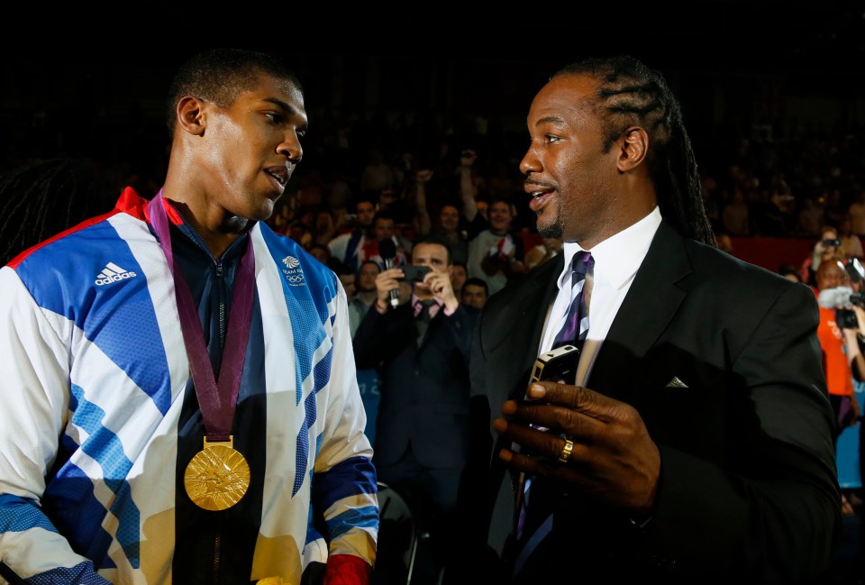 Joshua with Lennox Lewis after his 2012 London Olympics win