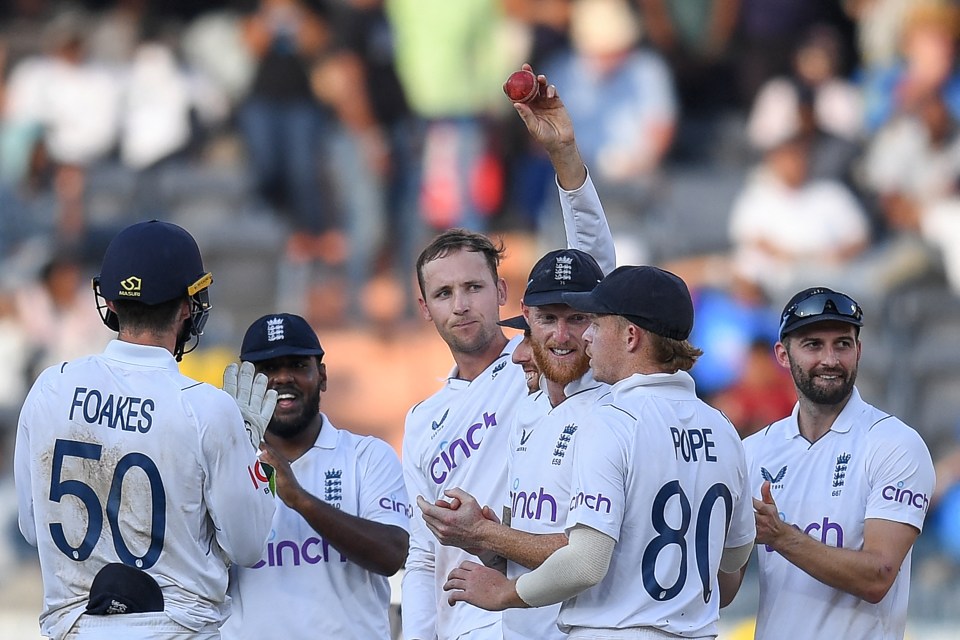 Hartley celebrates taking his fifth wicket