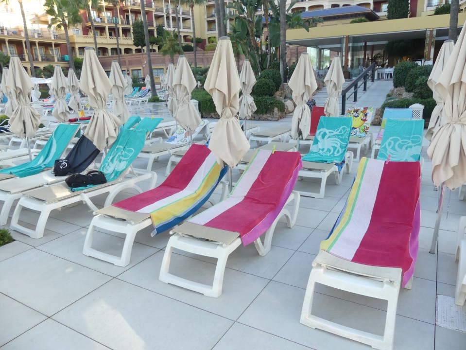 Sun bed wars- Torox, Costa del sol, Spain. .The Iberostar hotel , in the German tourist resort of Torrox, Costa del Sol, Spain where Brits and Germans were up and out before sunrise this morning, to do battle for the best sunbeds and layout their towels before the old enemy could beat them to prime poolside positions..