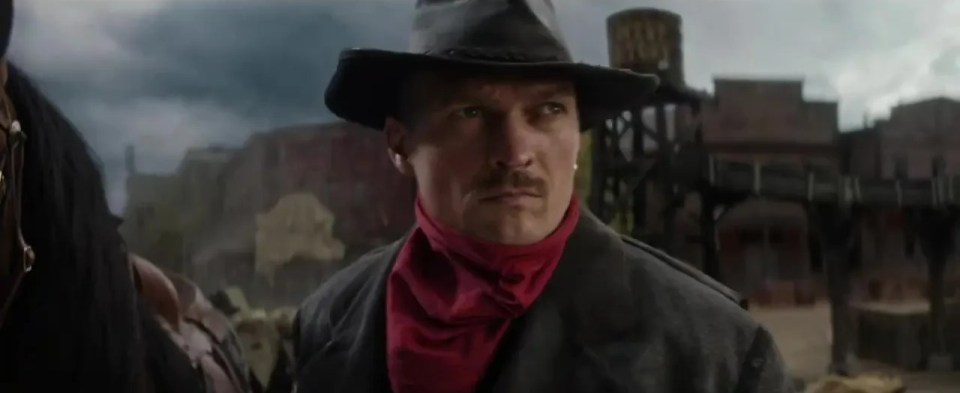 Usyk poses as a cowboy in the video