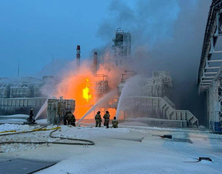 Firefighters extinguishing the blaze at a Russia power plant