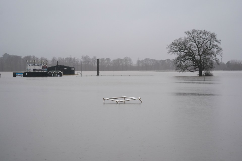 There is barely anything left to identify Worcester racecourse beneath the flooding