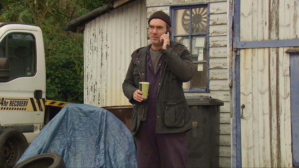 Cain Dingle was distracted from working on a Porsche by a call from wife Moira