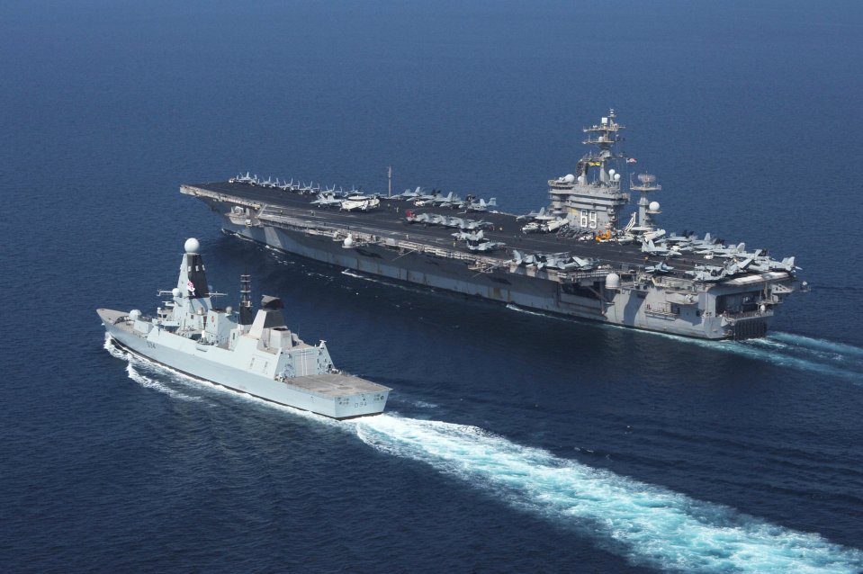 Royal Navy destroyer HMS Diamond alongside the carrier USS Dwight D. Eisenhower in the Red Sea