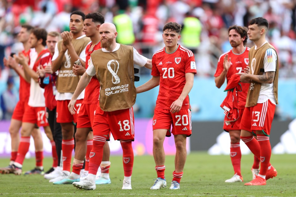 DOHA, QATAR - NOVEMBER 25: Jonny Williams (L) and Daniel James of Wales react after the 0-2 loss during the FIFA World Cup Qatar 2022 Group B match between Wales and IR Iran at Ahmad Bin Ali Stadium on November 25, 2022 in Doha, Qatar. (Photo by Julian Finney/Getty Images)