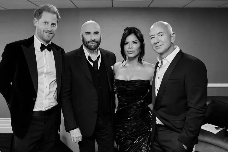 Harry has been mixing in celebrity circles – pictured here with John Travolta, Lauren Sanchez and Jeff Bezos