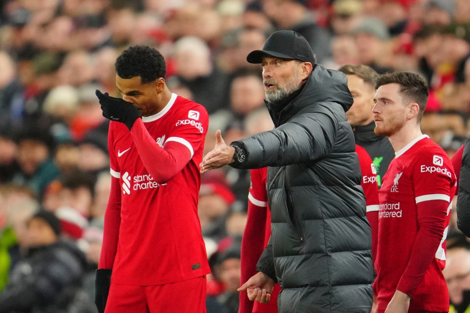 Cody Gakpo alongside Liverpool boss Jurgen Klopp