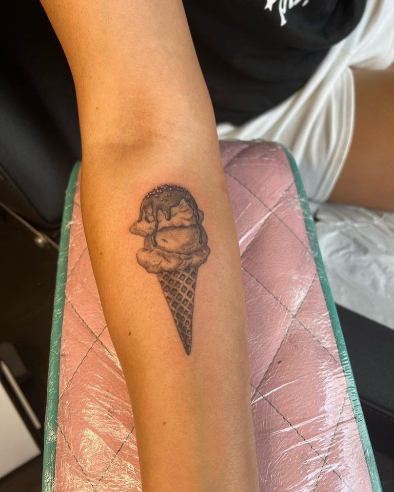 Kym has an ice cream tattoo in tribute to David