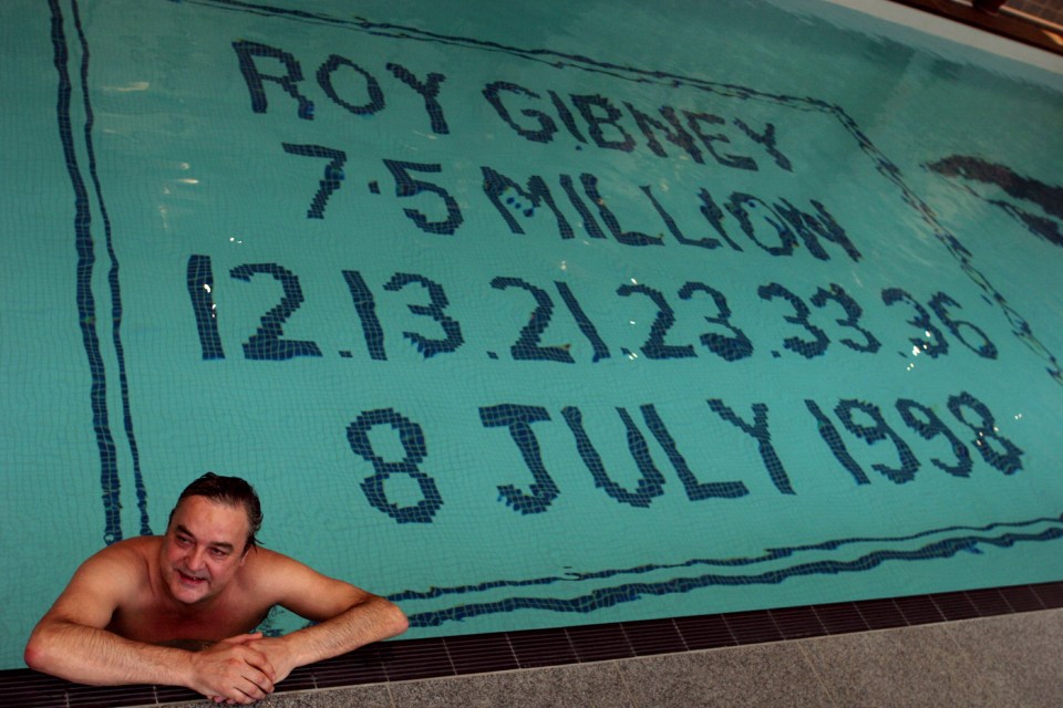 National Lottery winner Roy Gibney relaxes in the swimming pool at his home with his  winning numbers etched on the bottom