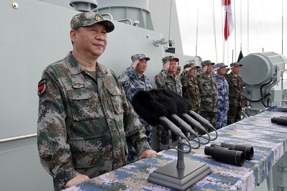 President Xi pictured in military dress in 2018