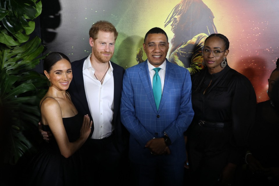 According to body language pro Judi James, Meghan Meghan 'stole the spotlight' and 'put herself in charge' as she and Prince Harry were spotted on the red carpet in Jamaica for a Bob Marley movie premiere