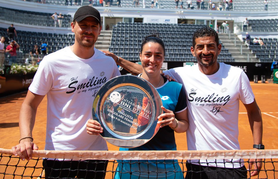 The Tunisian is joined on tour by husband Karim Kamoun, left, and coach Issam Jellali, right