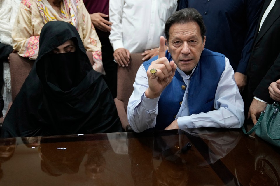 Imran Khan, right, and wife Bushra at an office of Lahore High Court in Lahore, Pakistan, in 2023